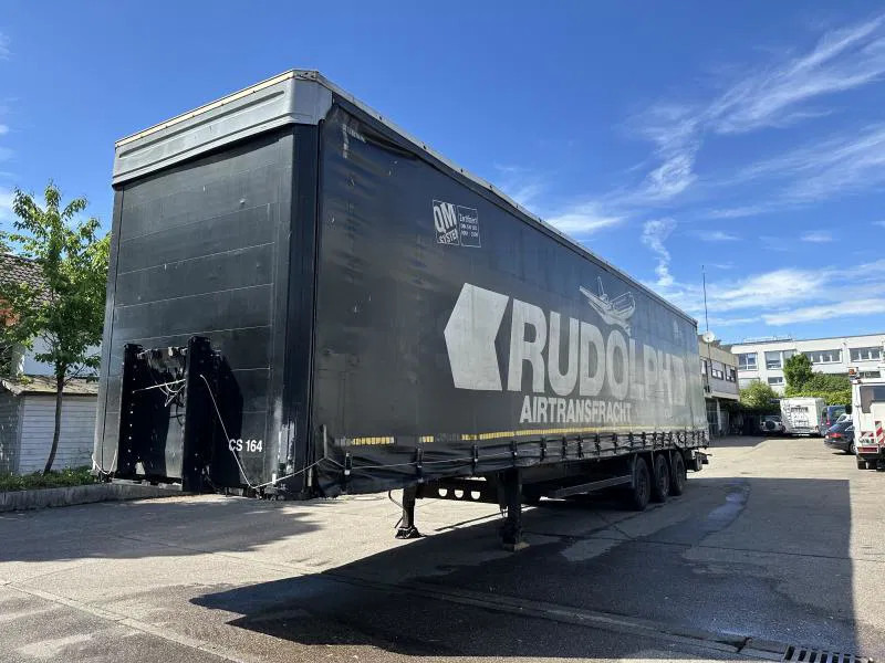 Kögel MEGA Tautliner mit ROLLENBETT Flughafentr. MEGA Tautliner mit ROLLENBETT Flughafentr. - סמיטריילר בתיבה סגורה: תמונה 1 Kögel MEGA Tautliner mit ROLLENBETT Flughafentr. MEGA Tautliner mit ROLLENBETT Flughafentr. - סמיטריילר בתיבה סגורה: תמונה 1