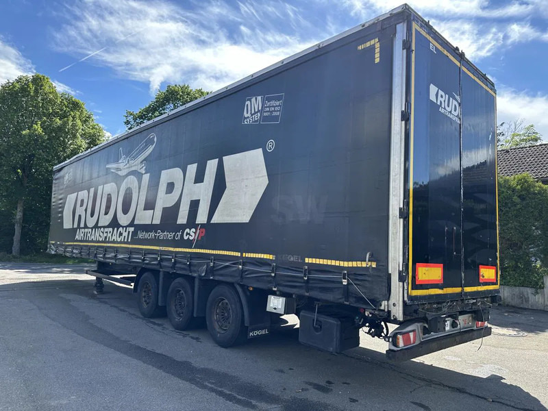Kögel MEGA Tautliner mit ROLLENBETT Flughafentr. MEGA Tautliner mit ROLLENBETT Flughafentr. - סמיטריילר בתיבה סגורה: תמונה 3 Kögel MEGA Tautliner mit ROLLENBETT Flughafentr. MEGA Tautliner mit ROLLENBETT Flughafentr. - סמיטריילר בתיבה סגורה: תמונה 3