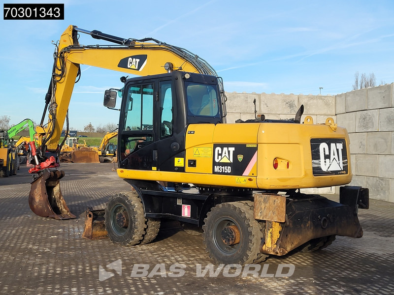 Caterpillar M315 D OUTRIGGERS + BLADE - מחפר גלגלים: תמונה 5 Caterpillar M315 D OUTRIGGERS + BLADE - מחפר גלגלים: תמונה 5