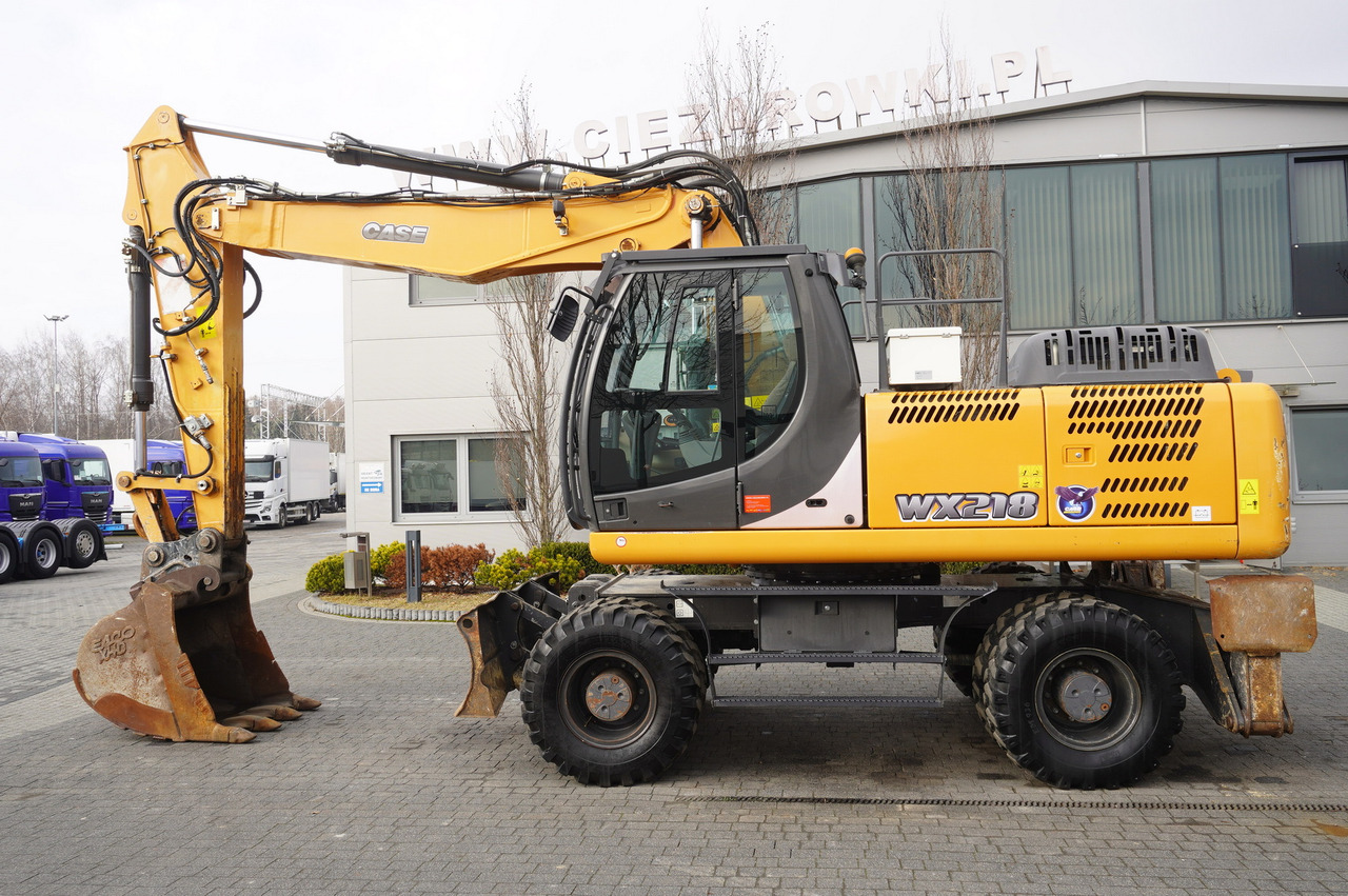 CASE WX218 / 23t wheeled excavator / 3 times folding arm - מחפר גלגלים: תמונה 1 CASE WX218 / 23t wheeled excavator / 3 times folding arm - מחפר גלגלים: תמונה 1