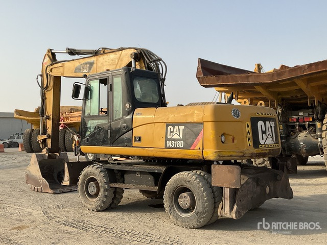 2012 Cat M318D - מחפר גלגלים: תמונה 4 2012 Cat M318D - מחפר גלגלים: תמונה 4