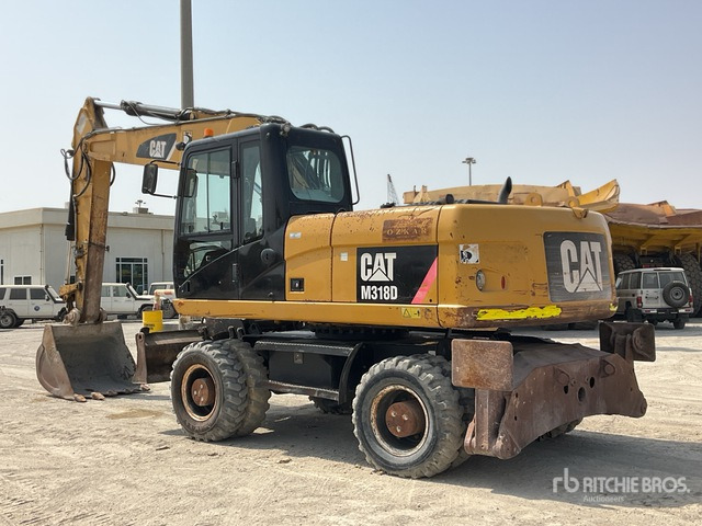 2012 Cat M318D - מחפר גלגלים: תמונה 4 2012 Cat M318D - מחפר גלגלים: תמונה 4