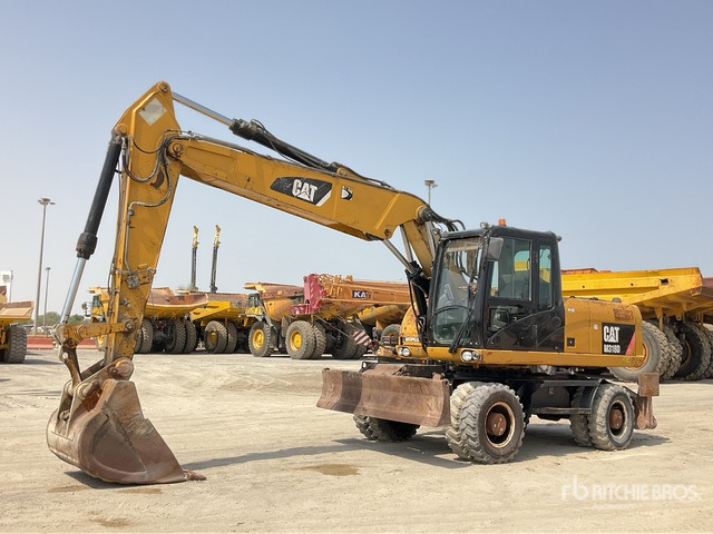 2012 Cat M318D - מחפר גלגלים: תמונה 1 2012 Cat M318D - מחפר גלגלים: תמונה 1