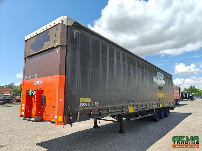 Schmitz Cargobull SCS 24/L - 13.62 E B (S01) 3-Assen SAF - MEGA - Schuifzeilen/Hef/SchuifDak - Gegalvaniseerd - Schijfremmen - סמיטריילר עם וילונות צד: תמונה 2 Schmitz Cargobull SCS 24/L - 13.62 E B (S01) 3-Assen SAF - MEGA - Schuifzeilen/Hef/SchuifDak - Gegalvaniseerd - Schijfremmen - סמיטריילר עם וילונות צד: תמונה 2