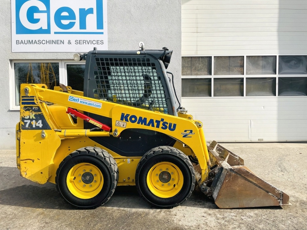 Komatsu SK714-5 (3948) - מעמיס היגוי החלקה: תמונה 2 Komatsu SK714-5 (3948) - מעמיס היגוי החלקה: תמונה 2