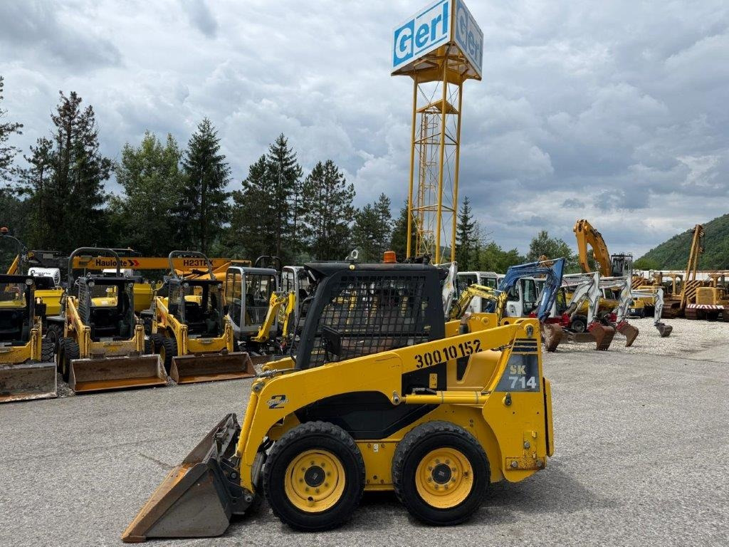 Komatsu SK714-5 (4026) - מעמיס היגוי החלקה: תמונה 3 Komatsu SK714-5 (4026) - מעמיס היגוי החלקה: תמונה 3