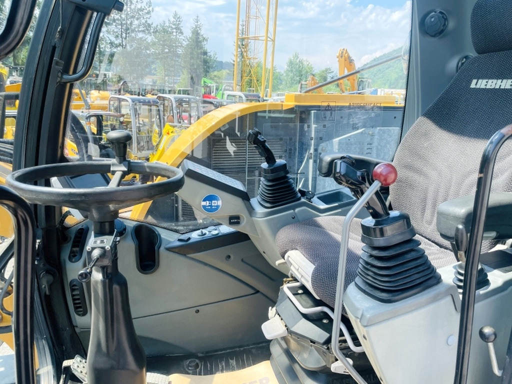 Liebherr A910 Compact (4025) - מחפר גלגלים: תמונה 5 Liebherr A910 Compact (4025) - מחפר גלגלים: תמונה 5