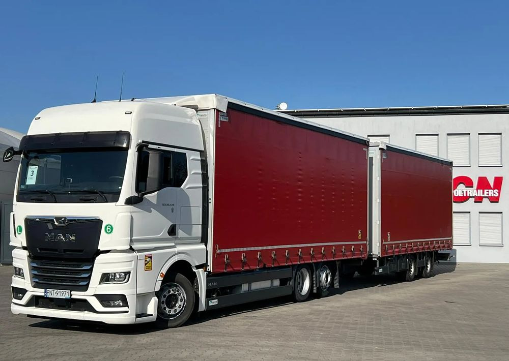 MAN TGX 26.470 z przyczepą Redos - משאית וילונות צד, קרון נגרר עם וילונות צד: תמונה 1 MAN TGX 26.470 z przyczepą Redos - משאית וילונות צד, קרון נגרר עם וילונות צד: תמונה 1