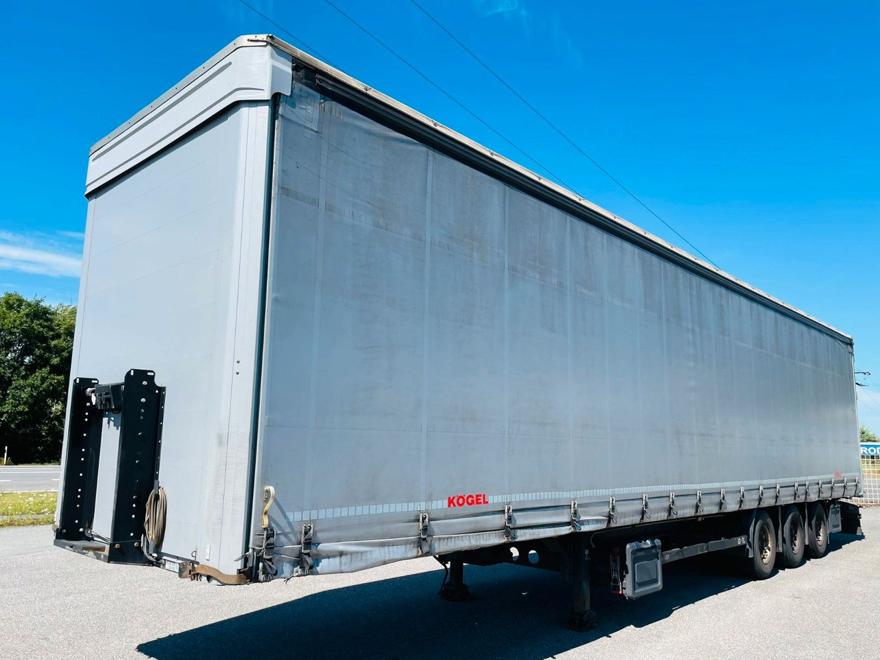 Kögel SN24 C3V - סמיטריילר עם וילונות צד: תמונה 1 Kögel SN24 C3V - סמיטריילר עם וילונות צד: תמונה 1