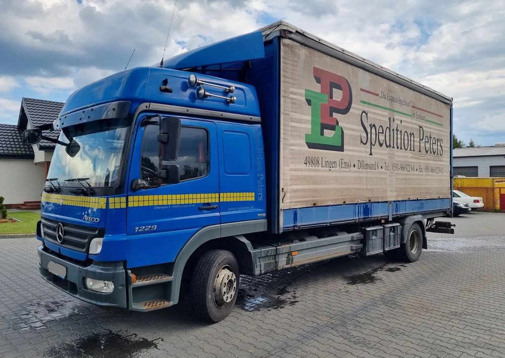 Mercedes-Benz Atego 1229 - משאית גרירה: תמונה 1 Mercedes-Benz Atego 1229 - משאית גרירה: תמונה 1