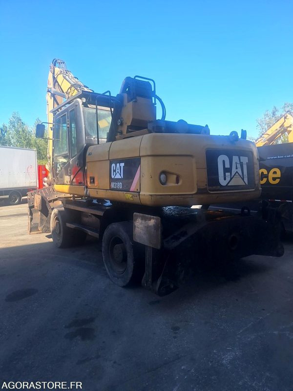 PELLE CAT M318D / R60290 - מחפר: תמונה 2 PELLE CAT M318D / R60290 - מחפר: תמונה 2