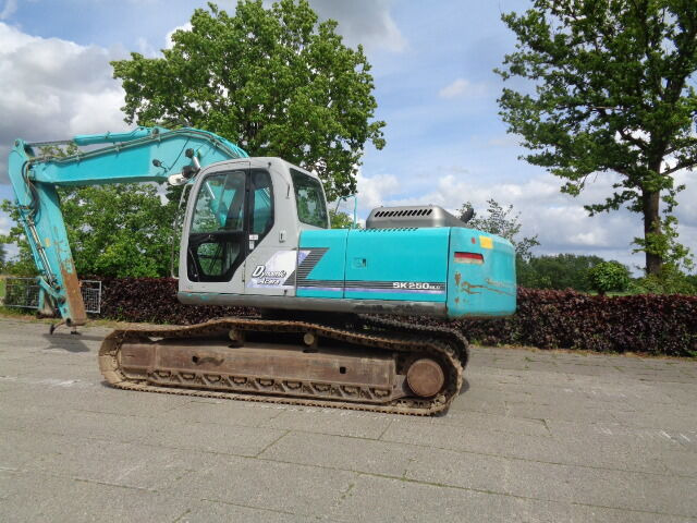 Kobelco SK250NLC - מחפר סורק: תמונה 1 Kobelco SK250NLC - מחפר סורק: תמונה 1