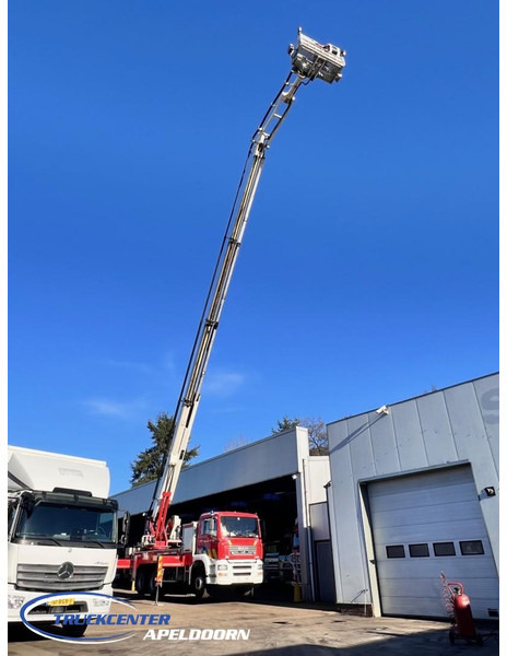 MAN TGA 26.350 Magirus ALP 320L = 32 meter, Waterpomp, 6x4, Bladgeveerd - משאית אש: תמונה 1 MAN TGA 26.350 Magirus ALP 320L = 32 meter, Waterpomp, 6x4, Bladgeveerd - משאית אש: תמונה 1
