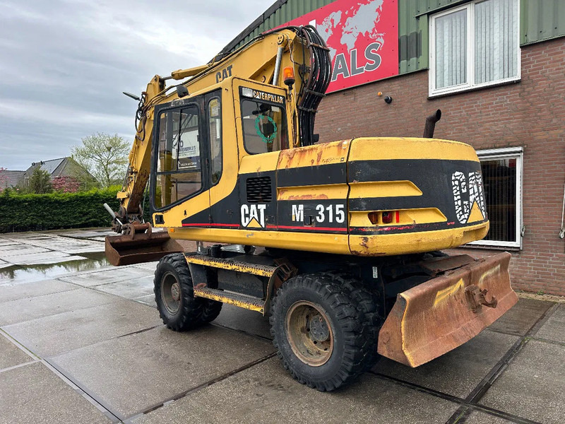 Caterpillar M315 +ROTO CE - מחפר גלגלים: תמונה 4 Caterpillar M315 +ROTO CE - מחפר גלגלים: תמונה 4