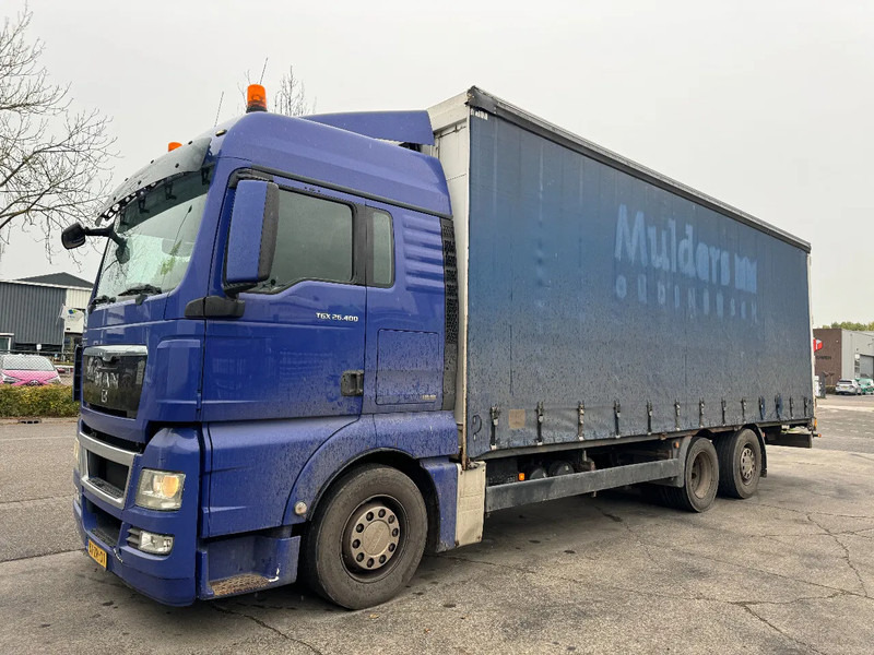 MAN TGX 26.400 6X2 - EURO 4 + LIFT + STEERING AXLE + TÜV 10-2025 - משאית וילונות צד: תמונה 1 MAN TGX 26.400 6X2 - EURO 4 + LIFT + STEERING AXLE + TÜV 10-2025 - משאית וילונות צד: תמונה 1