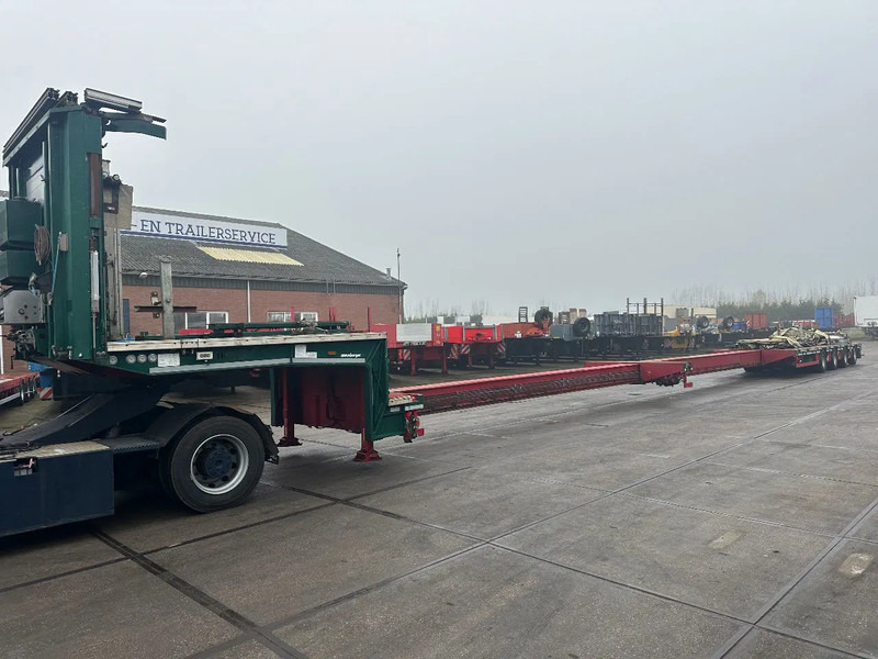MEUSBURGER 4 axel steering, Double extendable up to 28 meters, extendable up to 3.2 meters, radio controlled, sliding roof - סמיטריילר עם מטען נמוך: תמונה 1 MEUSBURGER 4 axel steering, Double extendable up to 28 meters, extendable up to 3.2 meters, radio controlled, sliding roof - סמיטריילר עם מטען נמוך: תמונה 1