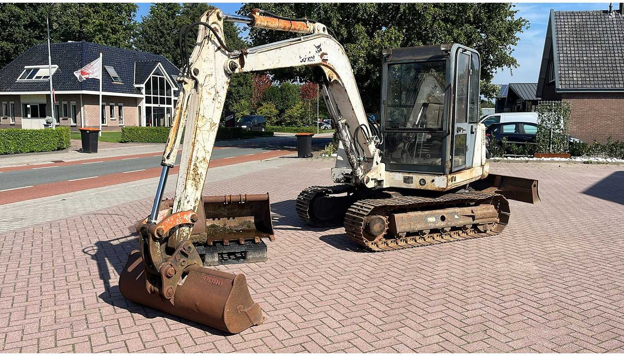 Bobcat X335 - מחפר סורק: תמונה 2 Bobcat X335 - מחפר סורק: תמונה 2