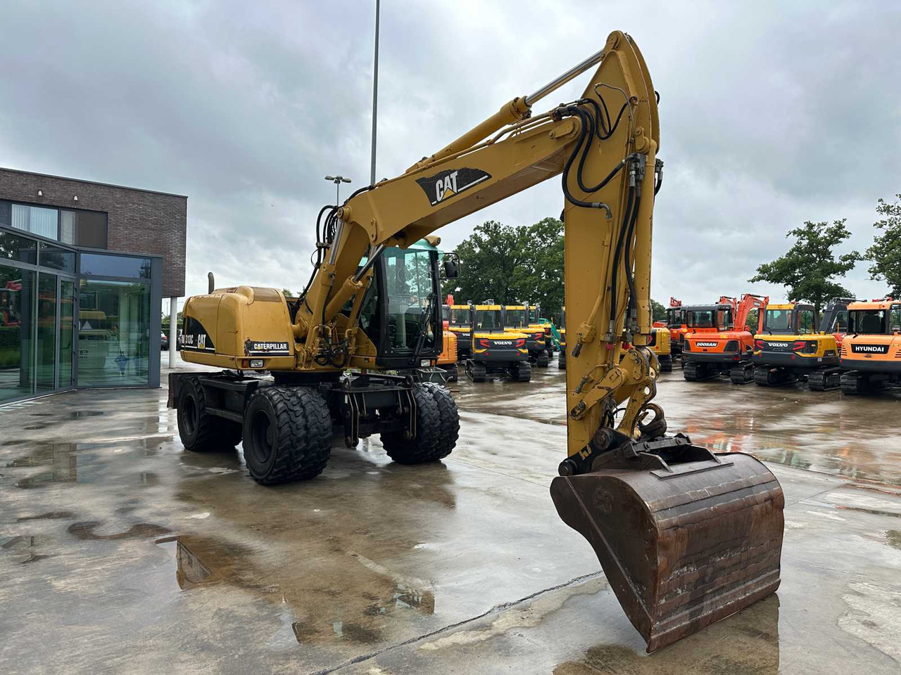 Caterpillar M313C - מחפר גלגלים: תמונה 3 Caterpillar M313C - מחפר גלגלים: תמונה 3