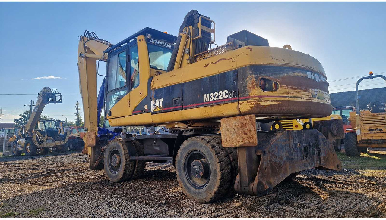 Caterpillar M322C - מחפר גלגלים: תמונה 2 Caterpillar M322C - מחפר גלגלים: תמונה 2