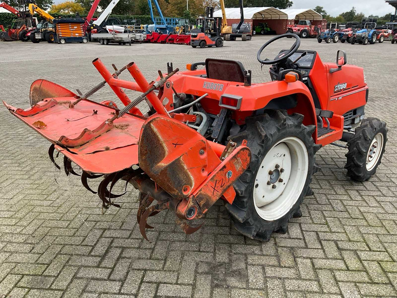 Kubota Saturn X-20 - טרקטור קומפקטי: תמונה 3 Kubota Saturn X-20 - טרקטור קומפקטי: תמונה 3