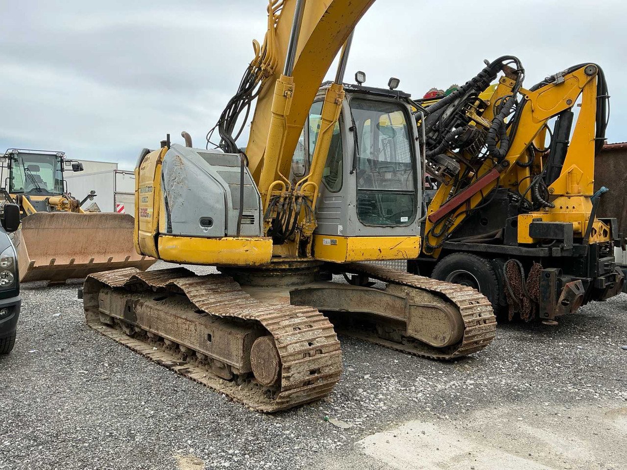 New Holland E235BSR-2 - מחפר סורק: תמונה 1 New Holland E235BSR-2 - מחפר סורק: תמונה 1