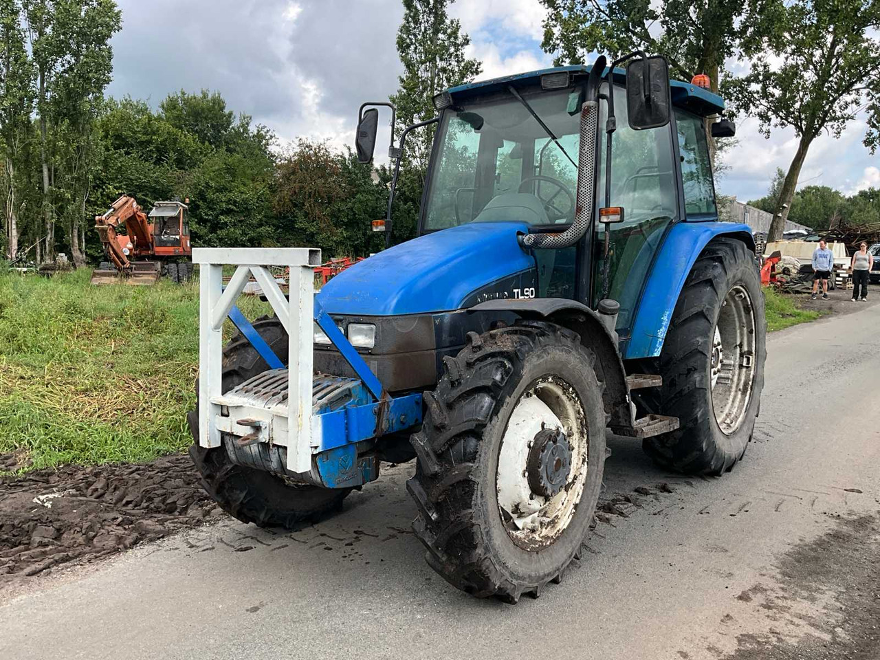 New Holland TL90 - טרקטור חקלאי: תמונה 1 New Holland TL90 - טרקטור חקלאי: תמונה 1