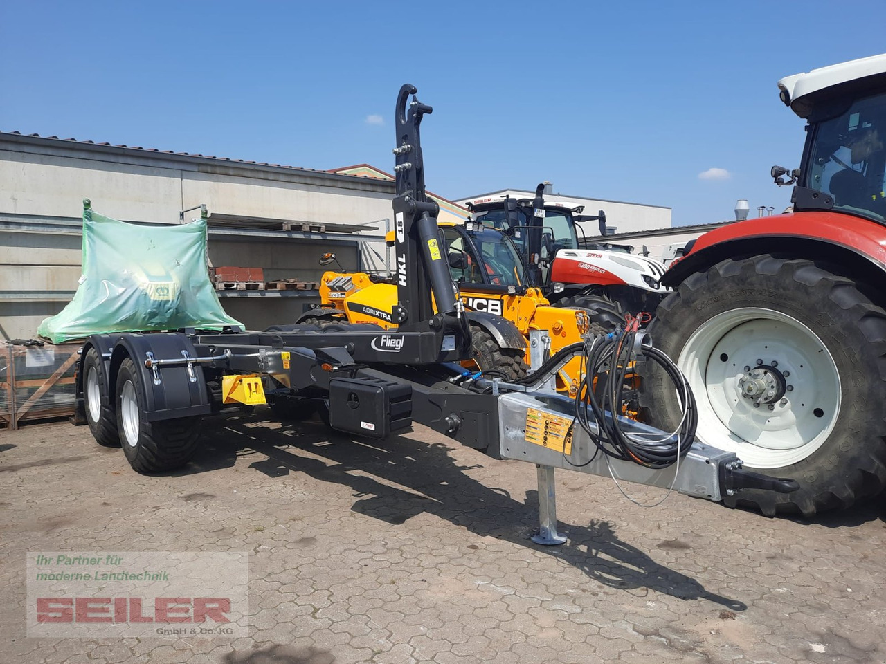 Fliegl HKL 18 Abrollkipper - קרון נגרר מתגלגל/ מדלג: תמונה 1 Fliegl HKL 18 Abrollkipper - קרון נגרר מתגלגל/ מדלג: תמונה 1