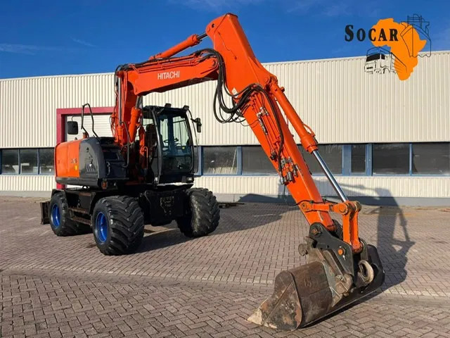 Hitachi ZX 140W-3 - מחפר גלגלים: תמונה 1 Hitachi ZX 140W-3 - מחפר גלגלים: תמונה 1