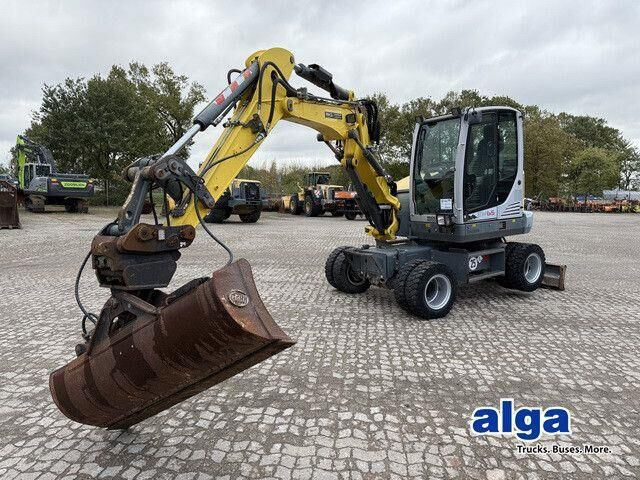 Neuson EW65, Verstellausleger, Hydr. S.W.S.,Div. Löffel - מחפר גלגלים: תמונה 1 Neuson EW65, Verstellausleger, Hydr. S.W.S.,Div. Löffel - מחפר גלגלים: תמונה 1