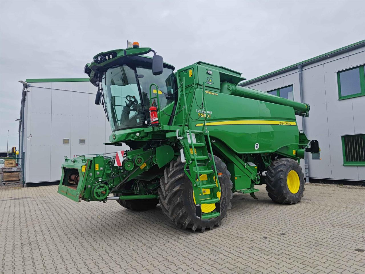 John Deere T560 Hillmaster - מקצרת קומבינה: תמונה 1 John Deere T560 Hillmaster - מקצרת קומבינה: תמונה 1