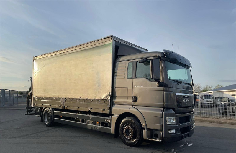 MAN TGX 18.400 Curtain Sider + Crane Palfinger 14002 EH - משאית תיבה: תמונה 1 MAN TGX 18.400 Curtain Sider + Crane Palfinger 14002 EH - משאית תיבה: תמונה 1