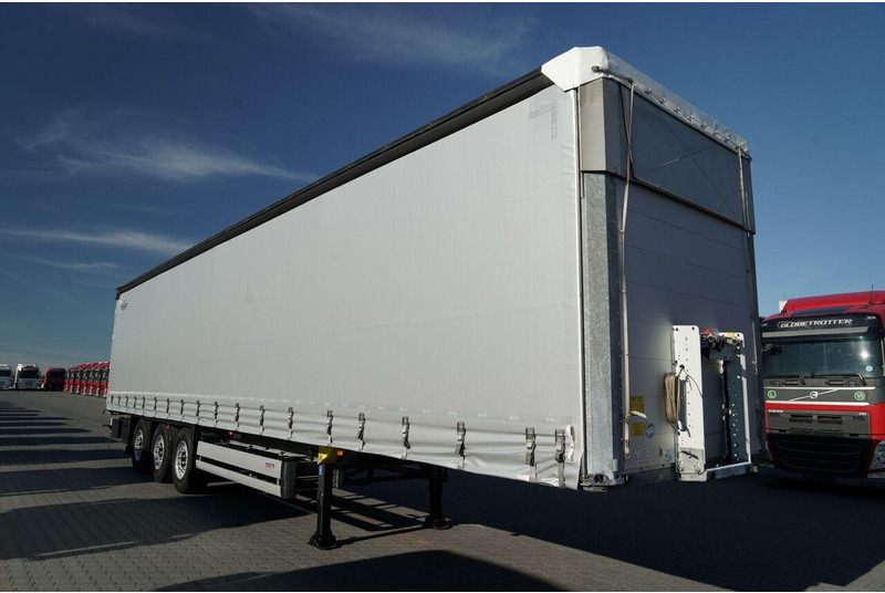 Schmitz Cargobull FIRANKA / STANDARD / MULDA DO STALI - 9 M / DACH PODNOSZONY / OŚ - סמיטריילר עם וילונות צד: תמונה 2 Schmitz Cargobull FIRANKA / STANDARD / MULDA DO STALI - 9 M / DACH PODNOSZONY / OŚ - סמיטריילר עם וילונות צד: תמונה 2