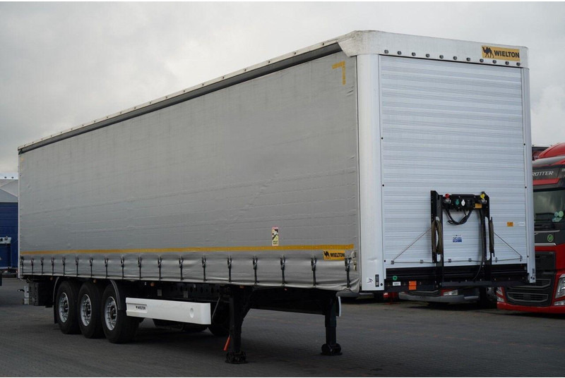 Wielton FIRANKA / STANDARD / OŚ PODNOSZONA / PLANDEKA ZBROJONA - סמיטריילר עם וילונות צד: תמונה 1 Wielton FIRANKA / STANDARD / OŚ PODNOSZONA / PLANDEKA ZBROJONA - סמיטריילר עם וילונות צד: תמונה 1