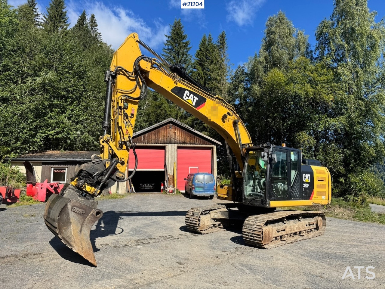 Caterpillar 323FL - מחפר סורק: תמונה 1 Caterpillar 323FL - מחפר סורק: תמונה 1