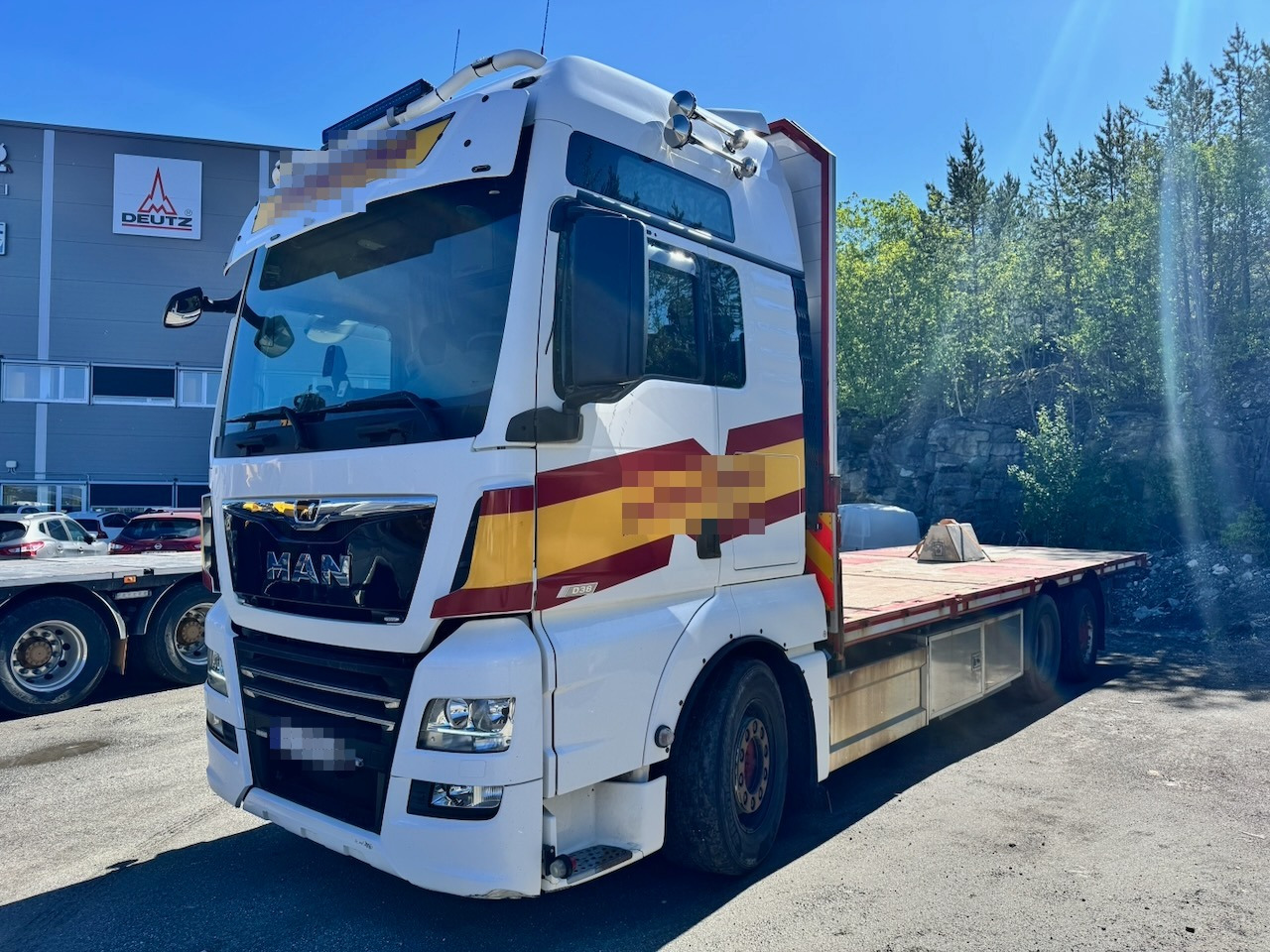 MAN TGX 580 - משאית צד נופל/ שטוחה: תמונה 1 MAN TGX 580 - משאית צד נופל/ שטוחה: תמונה 1