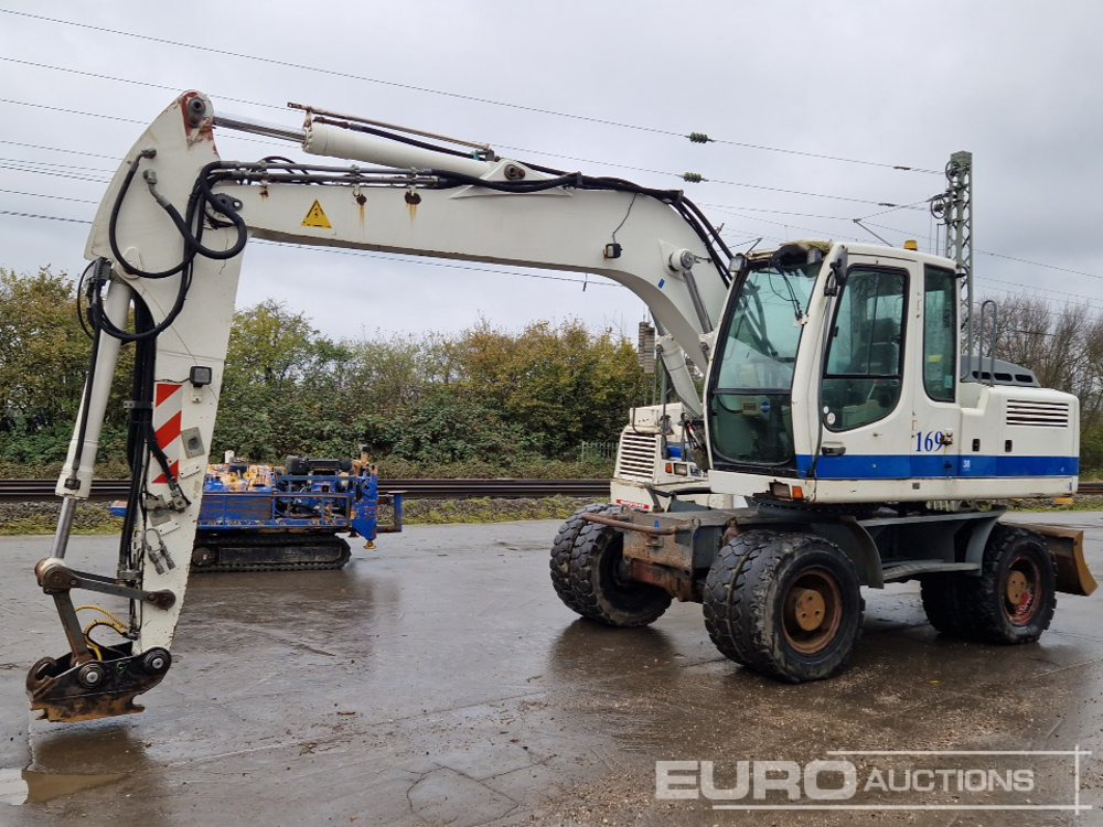 Liebherr A900C - מחפר גלגלים: תמונה 1 Liebherr A900C - מחפר גלגלים: תמונה 1