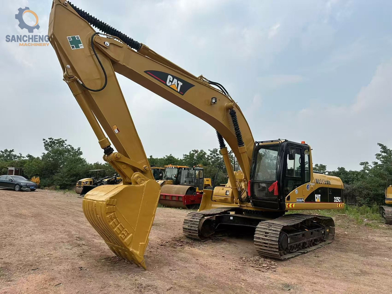 מחפר סורק CAT 325 CL: תמונה 14
