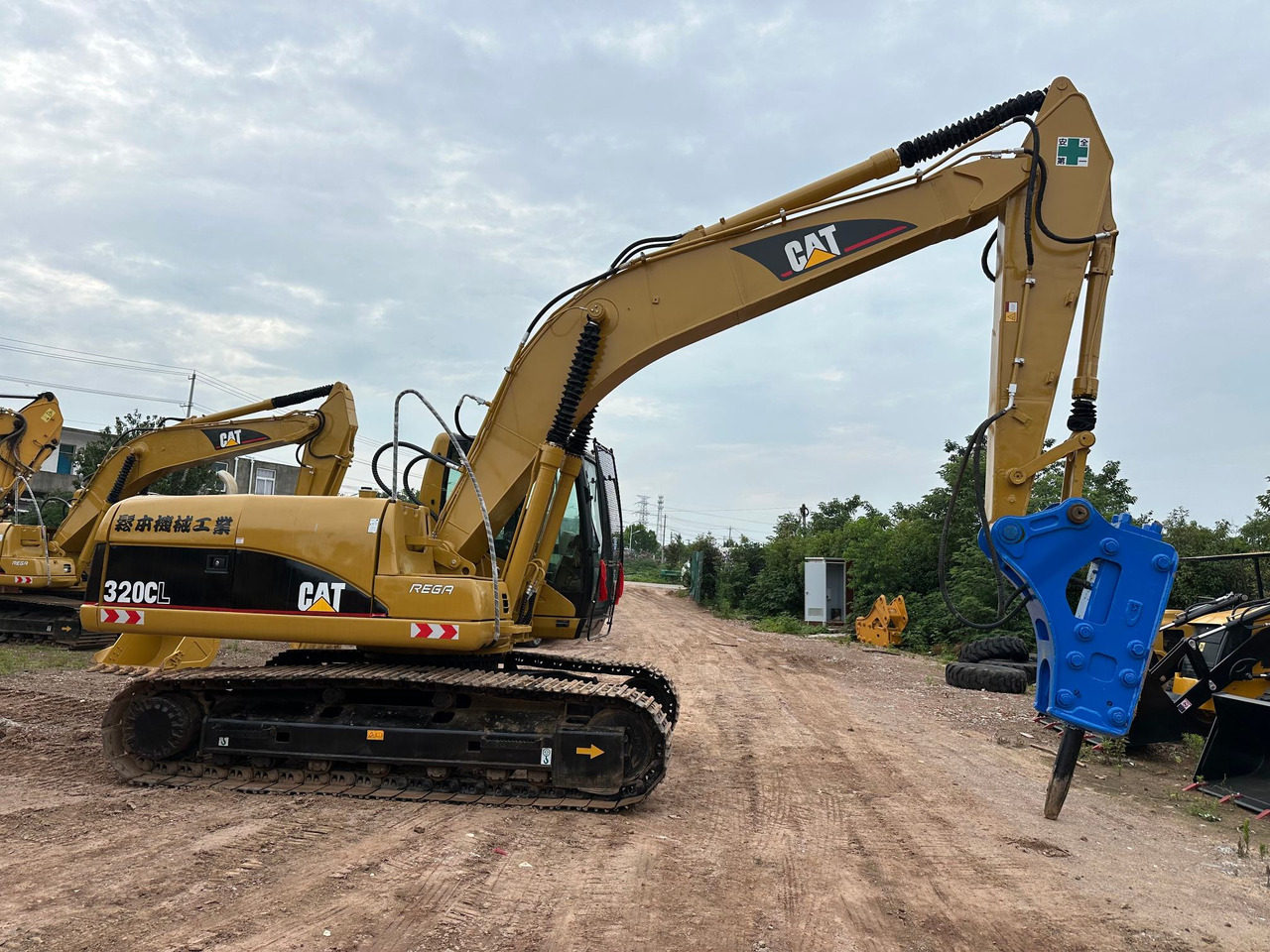 CATERPILLAR 320CL - מחפר סורק: תמונה 1 CATERPILLAR 320CL - מחפר סורק: תמונה 1
