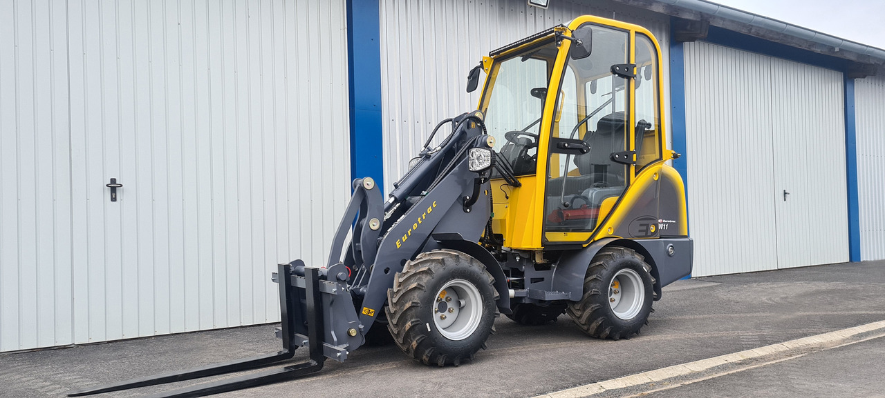 Eurotrac W11 Radlader Hoflader - מעמיס קומפקטי: תמונה 1 Eurotrac W11 Radlader Hoflader - מעמיס קומפקטי: תמונה 1