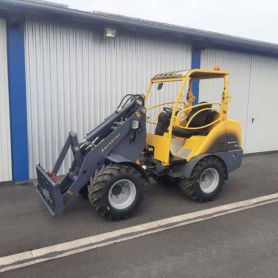 Eurotrac W12 Radlader Hoflader - מעמיס קומפקטי: תמונה 1 Eurotrac W12 Radlader Hoflader - מעמיס קומפקטי: תמונה 1