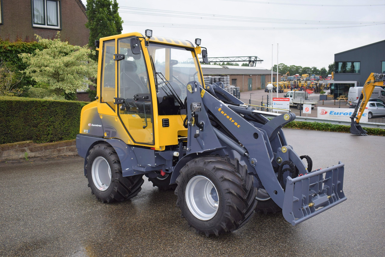 Eurotrac W13 Radlader Hoflader - מעמיס קומפקטי: תמונה 4 Eurotrac W13 Radlader Hoflader - מעמיס קומפקטי: תמונה 4