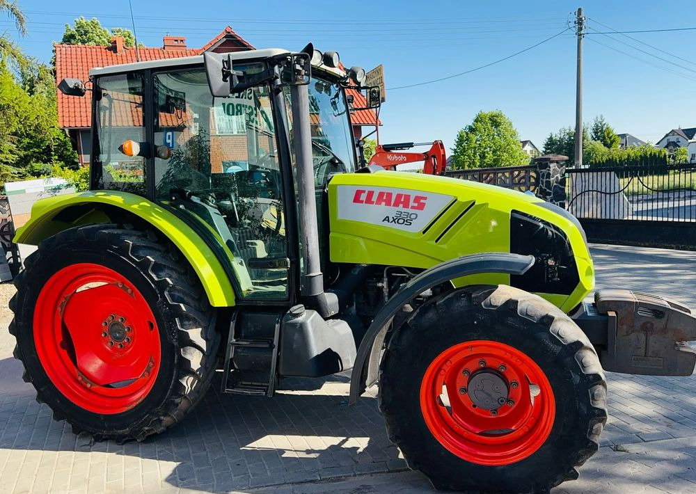 Claas Axos 330 - טרקטור חקלאי: תמונה 1 Claas Axos 330 - טרקטור חקלאי: תמונה 1