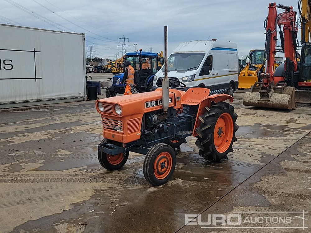 Kubota L1500 - טרקטור קומפקטי: תמונה 1 Kubota L1500 - טרקטור קומפקטי: תמונה 1