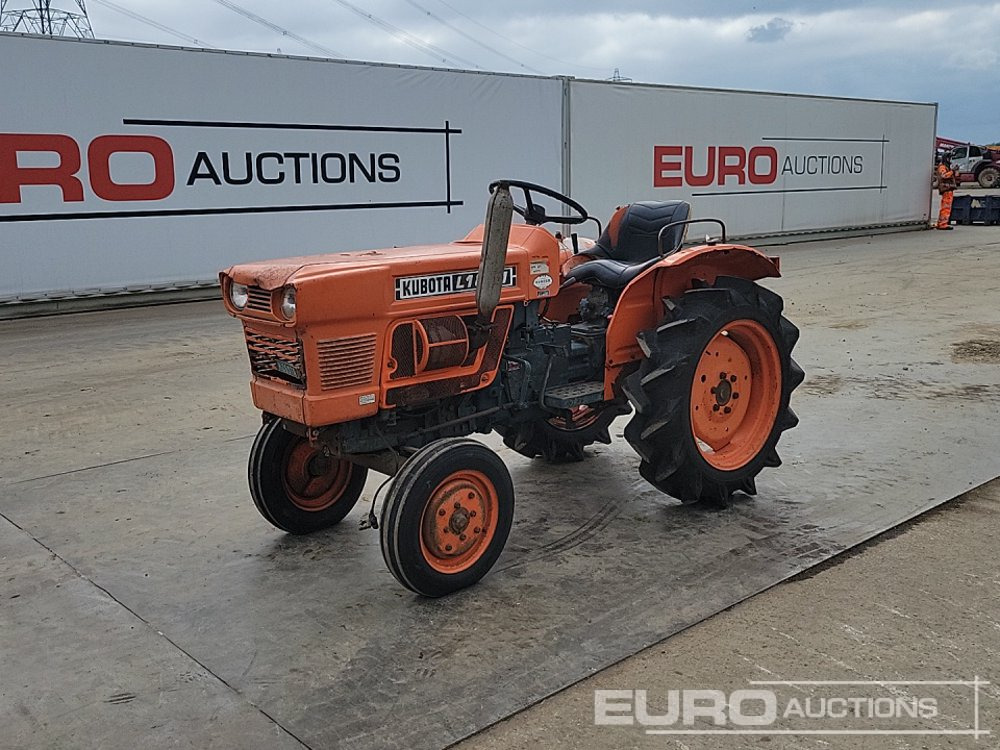 Kubota L1801 - טרקטור קומפקטי: תמונה 1 Kubota L1801 - טרקטור קומפקטי: תמונה 1