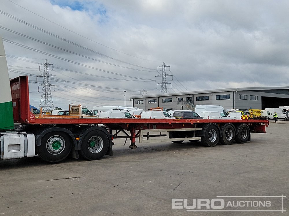 Montracon Tri Axle Flatbed Trailer - סמיטריילר צד נופל/ שטוח: תמונה 1 Montracon Tri Axle Flatbed Trailer - סמיטריילר צד נופל/ שטוח: תמונה 1