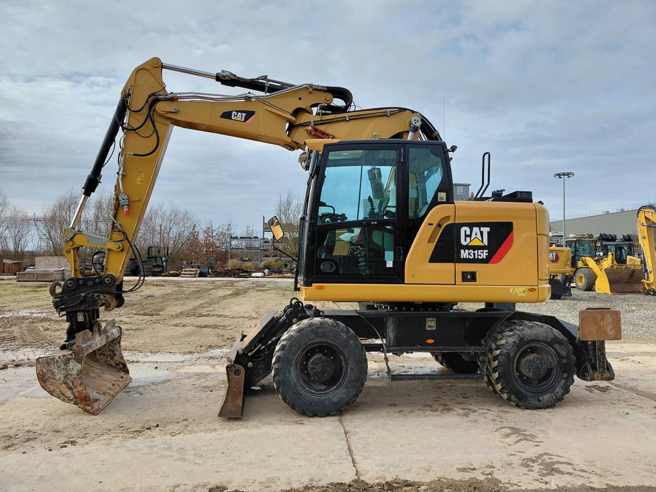 CAT M315F IVC - מחפר גלגלים: תמונה 1 CAT M315F IVC - מחפר גלגלים: תמונה 1