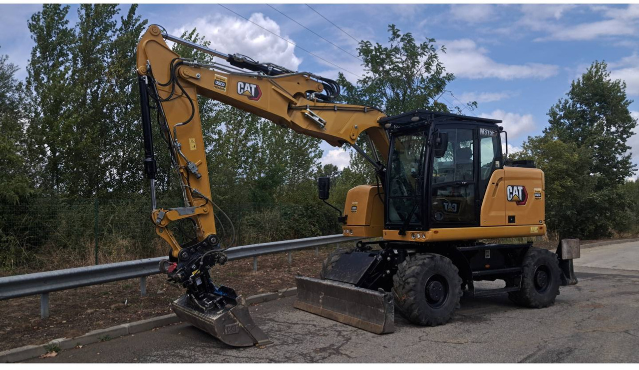 CAT M315F IVC - מחפר גלגלים: תמונה 1 CAT M315F IVC - מחפר גלגלים: תמונה 1