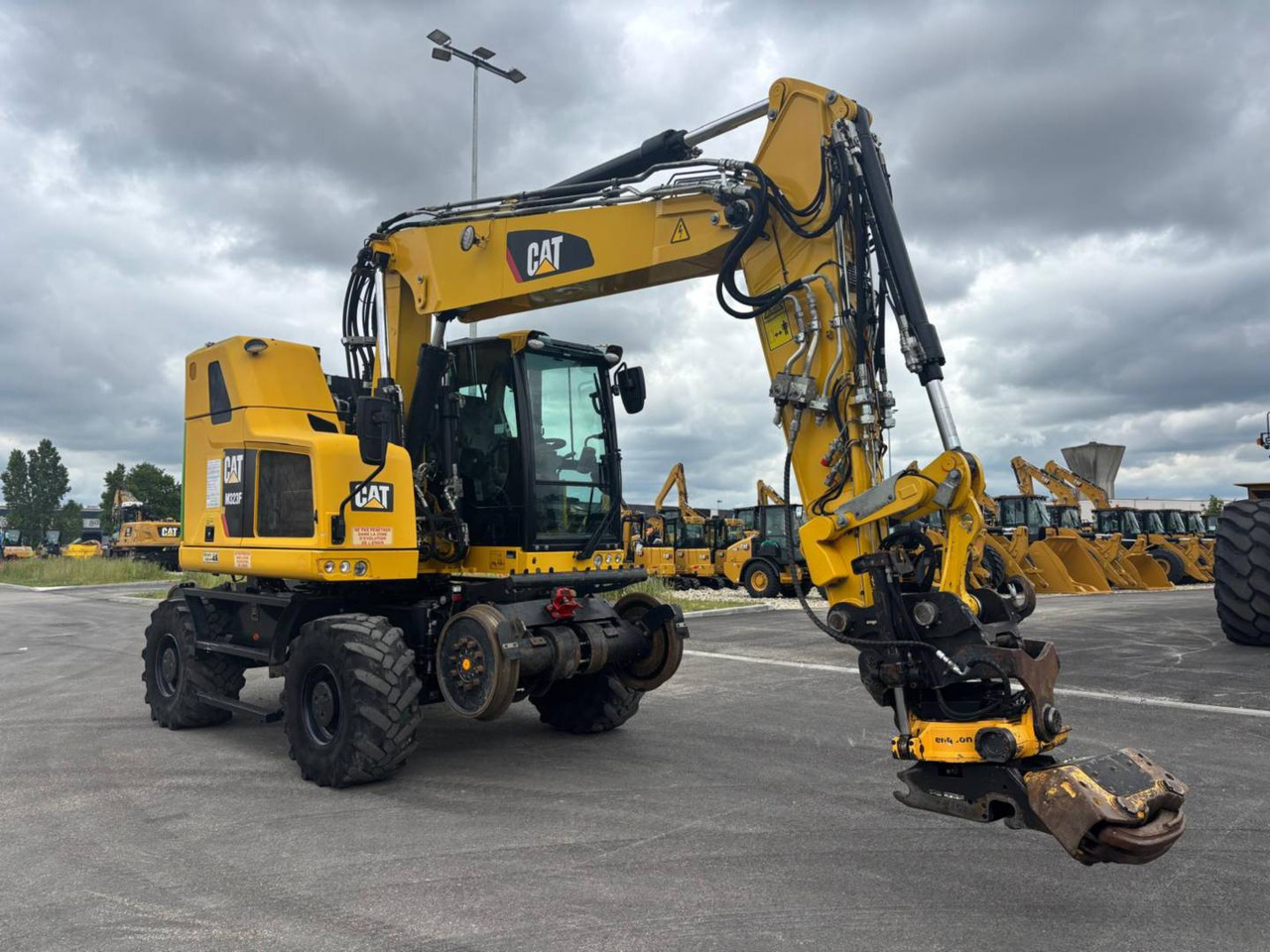 CAT M323F - מחפר גלגלים: תמונה 1 CAT M323F - מחפר גלגלים: תמונה 1