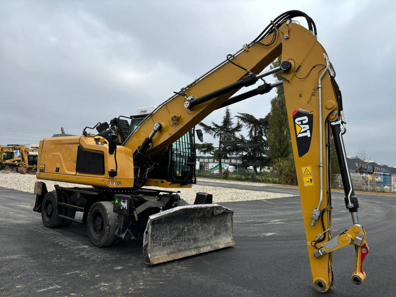 CAT MH3022-1 - מחפר גלגלים: תמונה 1 CAT MH3022-1 - מחפר גלגלים: תמונה 1