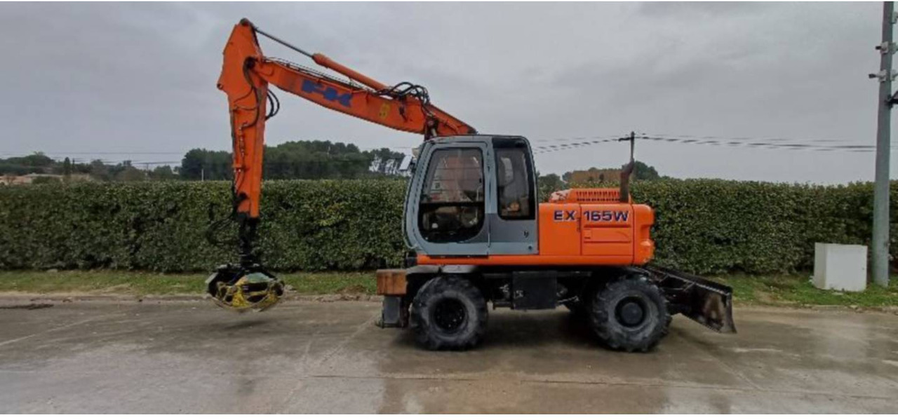 FIAT ALLIS / NEW HOLLAND EX165W - מחפר גלגלים: תמונה 1 FIAT ALLIS / NEW HOLLAND EX165W - מחפר גלגלים: תמונה 1